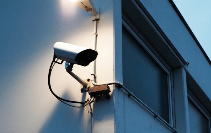 An alarm system with a CCTV surveilling the premises of the building